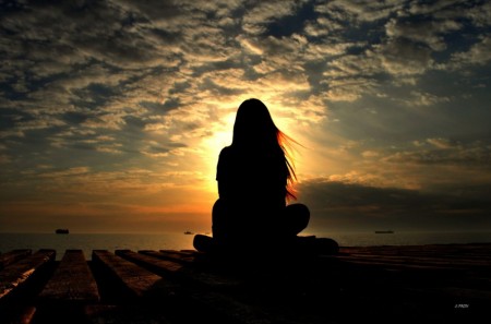 woman looking at the sky